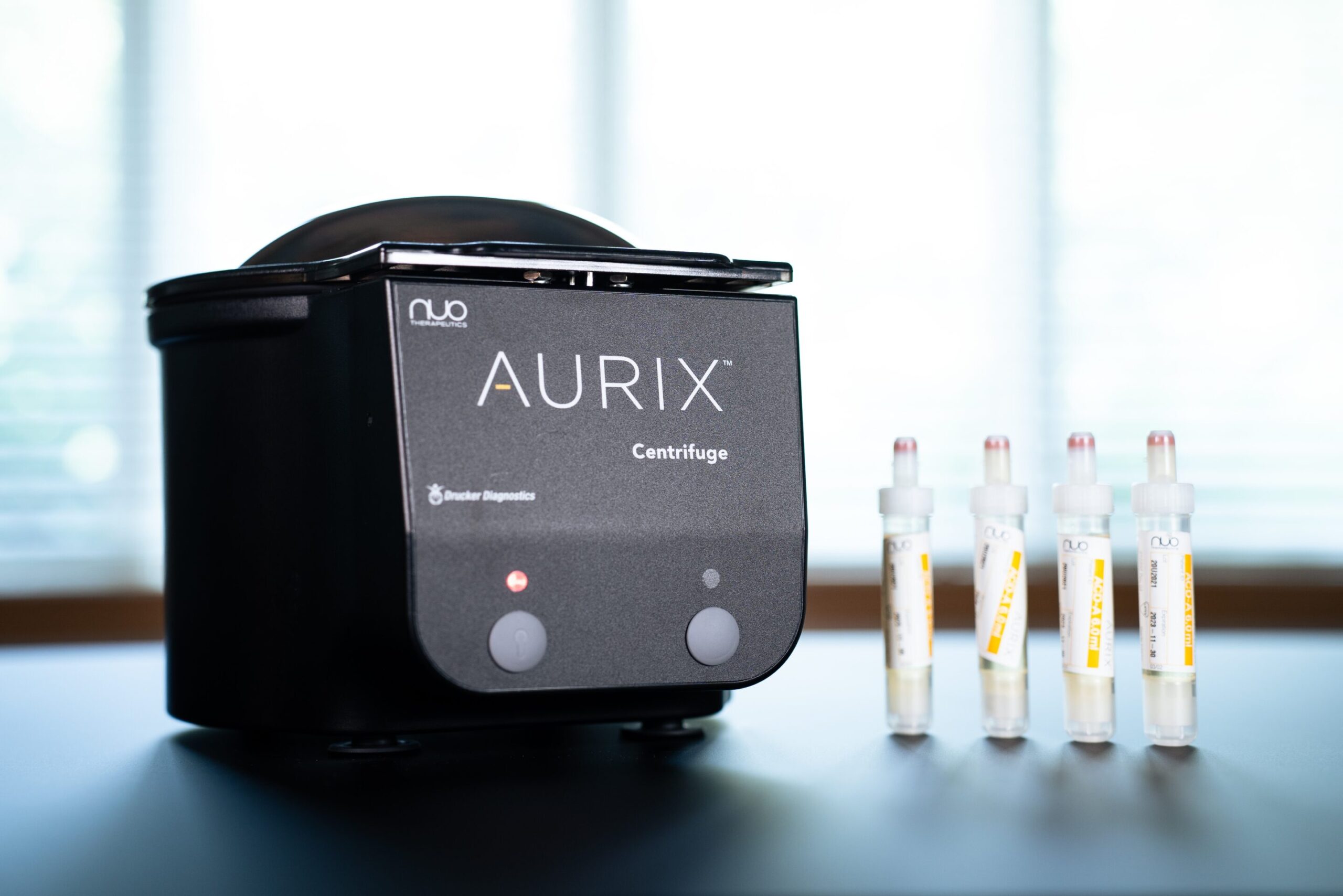 AURIX Centrifuge medical device with test tubes for platelet-rich plasma therapy in podiatric treatmen